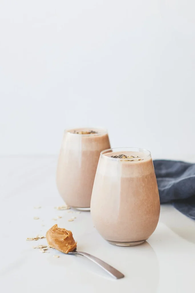 Smoothie and a spoon of peanut butter